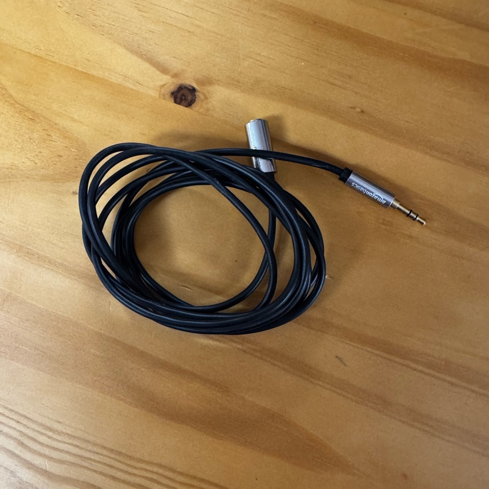 Silver and Black MP3 Player with Wired Earbuds